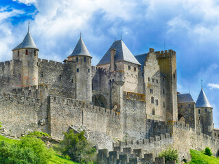 Fototapeta na wymiar Exterior view of the fortress and citadel walls and towers o of medieval Carcassonne