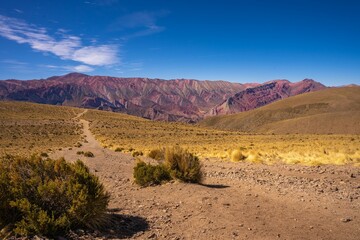 Road leading to the Seven Colors Hill in the village of Purmamarca, Quebrada de Humahuaca, Argentina