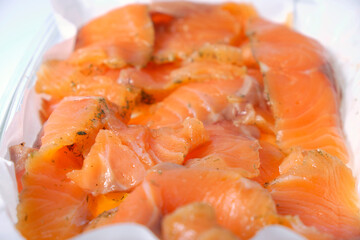 delicious pieces of lightly salted salmon according to a  with herbs