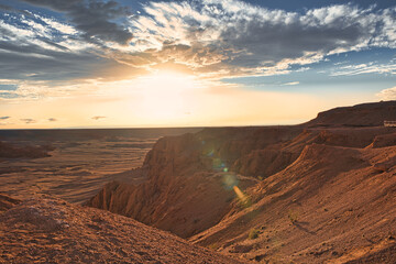 Naklejka premium The Golden hour of Desert, Flaming cliff, Mongolia at Sunset