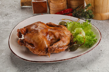 Baked small chicken with spices