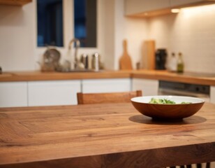 Empty wooden table in the kitchen with a plate of greens or vegetables, blurred background, modern interior style, background for the presentation of products, food, recipes. copy space