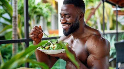 bodybuilder eating salad