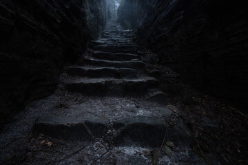 Gloomy and totally moody stone stairs in the foggy rocks with the best dark and mystic atmosphere in the north of Bohemia.
