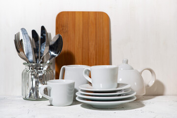 wooden cutting board and tableware
