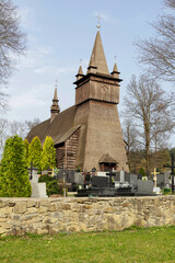 ORAWKA, POLAND - APRIL 01, 2024: John the Baptist Church, made of wood, in Orawka, Lesser Poland Voivodeship.