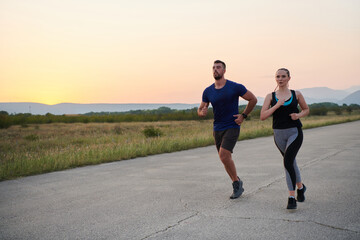 Dynamic Duo: Fitness-Ready Couple Embraces Confidence and Preparation for Upcoming Marathons