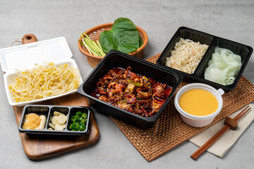 Korean food, webfoot octopus, stir-fry, pork belly, rice, lunch box, shrimp, bean sprout soup, steamed eggs, chili peppers, garlic, radish wraps, flying fish roe, perilla leaf