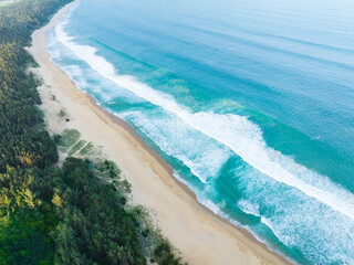 Aerial photography of the summer coastline of Dahuajiao, Wanning, Hainan, China