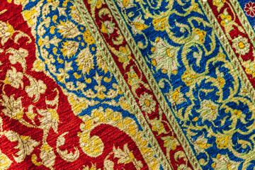Oriental silk carpet with colorful pattern