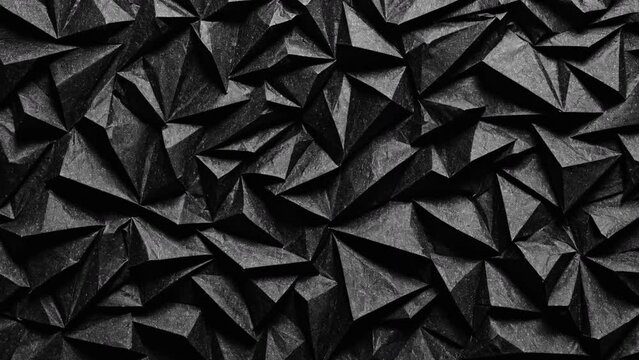 Animated black crumpled paper, dark background. Stop motion animated looped background