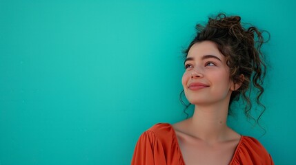Dreamy Young Woman Against Turquoise