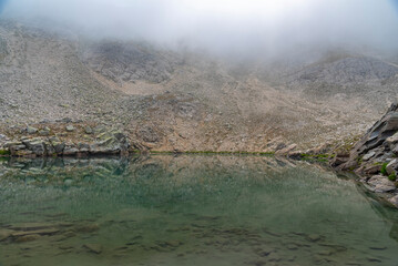uludag glacial lake trekking and camping point reflection of the lake fog cloudy sky wonderful...
