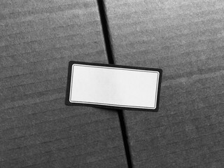Blank sticker on cardboard box