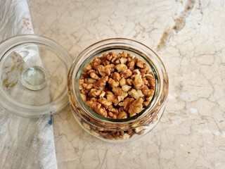 Glass bowl with walnuts