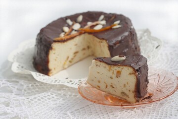 Cheesecake with chocolate icing as Easter festive traditional cake