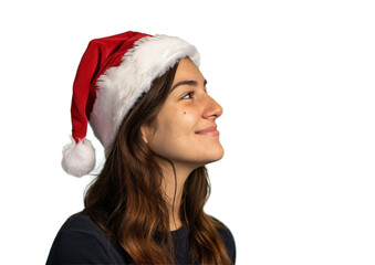 Woman in santa claus hat. Close-up of smiling woman in dark shirt and Santa hat looking sideways on light transparent background. Christmas elements.