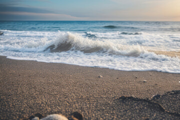Sun-kissed sand meets turquoise waves on a tropical coastline