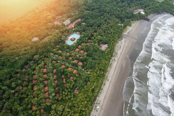 Beach coastline near tropical resort hotel