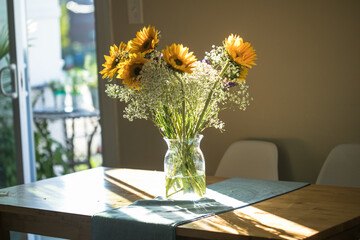 bouquet of flowers on a table in a living room