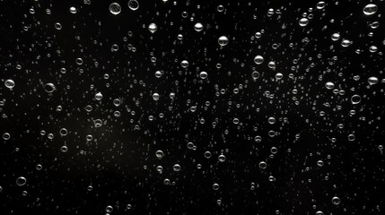 A black and white photo of a cloudy sky with many small droplets of water