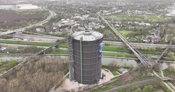 The Gasometer, industrial monument and landmark in the city of Oberhausen, Germany. Musuem and touristic attraction. Aerial drone view.
