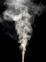Steam or abstract white smog isolated on a black rising upward