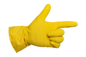 A hand in yellow rubber gloves shows the index finger on a white background. Isolate rubber gloves for cleaning and washing dishes