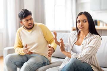 Young Indian Couple Arguing in Living Room