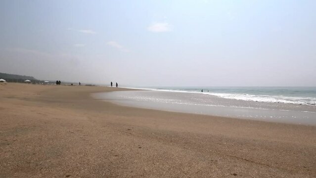 Waves crashing on the beach at Adimalathura, Thiruvananthapuram, Kerala, India