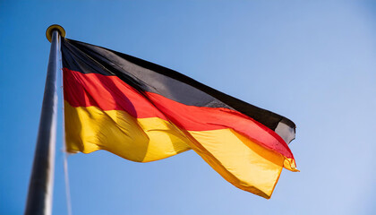 Fahne, die Nationalfahne von Deutschland flattert im Wind - obrazy, fototapety, plakaty
