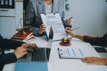 Businessman and lawyer discuss the contract document. Treaty of the law. Sign a contract business.