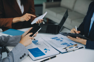 Business team working with new startup project plan and discussion information for financial...
