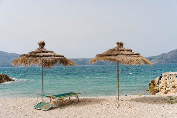 Fototapeta premium Albania, Radhime Vlore beach, emerald color clear sea water