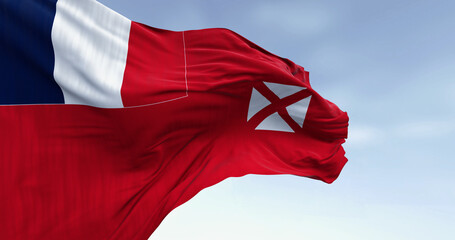 National flag of Wallis and Futuna waving on a clear day.