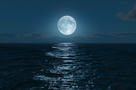 Romantic blue moon over ocean.