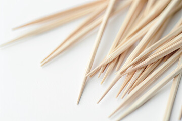 Toothpicks on white background close-up - obrazy, fototapety, plakaty