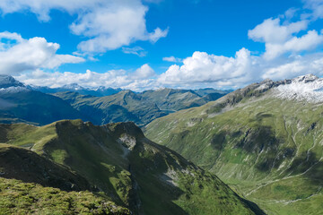 Panoramic view of majestic snow capped mountain peaks in Glockner group in High Tauern National...