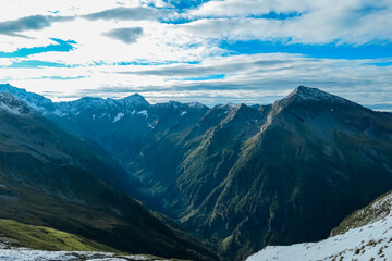 Panoramic sunrise view of snow capped alpine terrain in High Tauern National Park, Carinthia,...