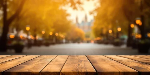Foto op Canvas The empty wooden table top with blur background of European street in autumn. Exuberant image. generative AI © Summit Art Creations