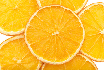Background of dry orange slices close-up. Orange texture