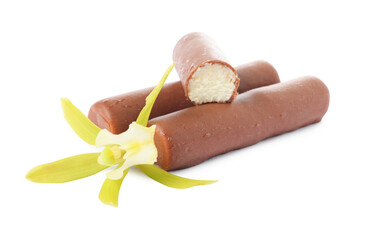 Glazed curd cheese bars and vanilla flower isolated on white