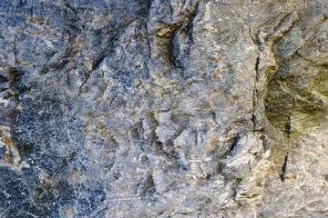 Gray granite stone background. Geology.