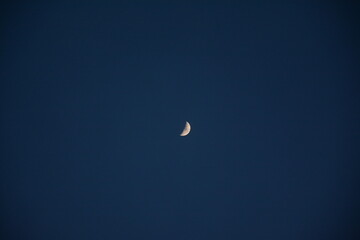 Obraz na płótnie Canvas Moonlight, crescent, moon shines in the sky. Beautiful view of night sky.