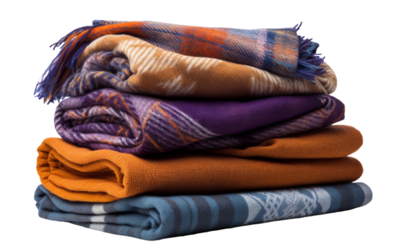 A stack of cozy blankets arranged neatly on top of each other