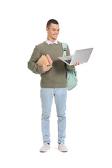 Male student with books and laptop on white background. End of school concept