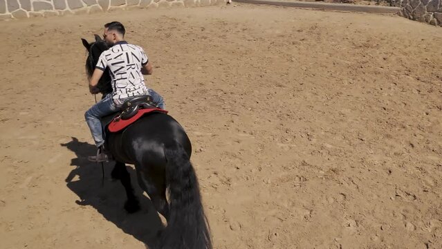 riding black horse