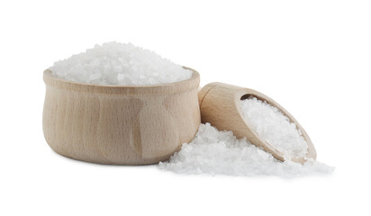 Natural salt in wooden bowl and scoop isolated on white