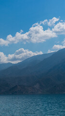 Lake Potrerillos in Mendoza, Argentina. Blue lake in the mountains with a beautiful sky