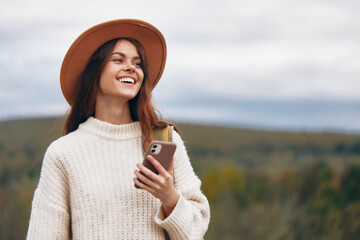 Mountain Woman on Phone: Lifestyle Freedom in Nature